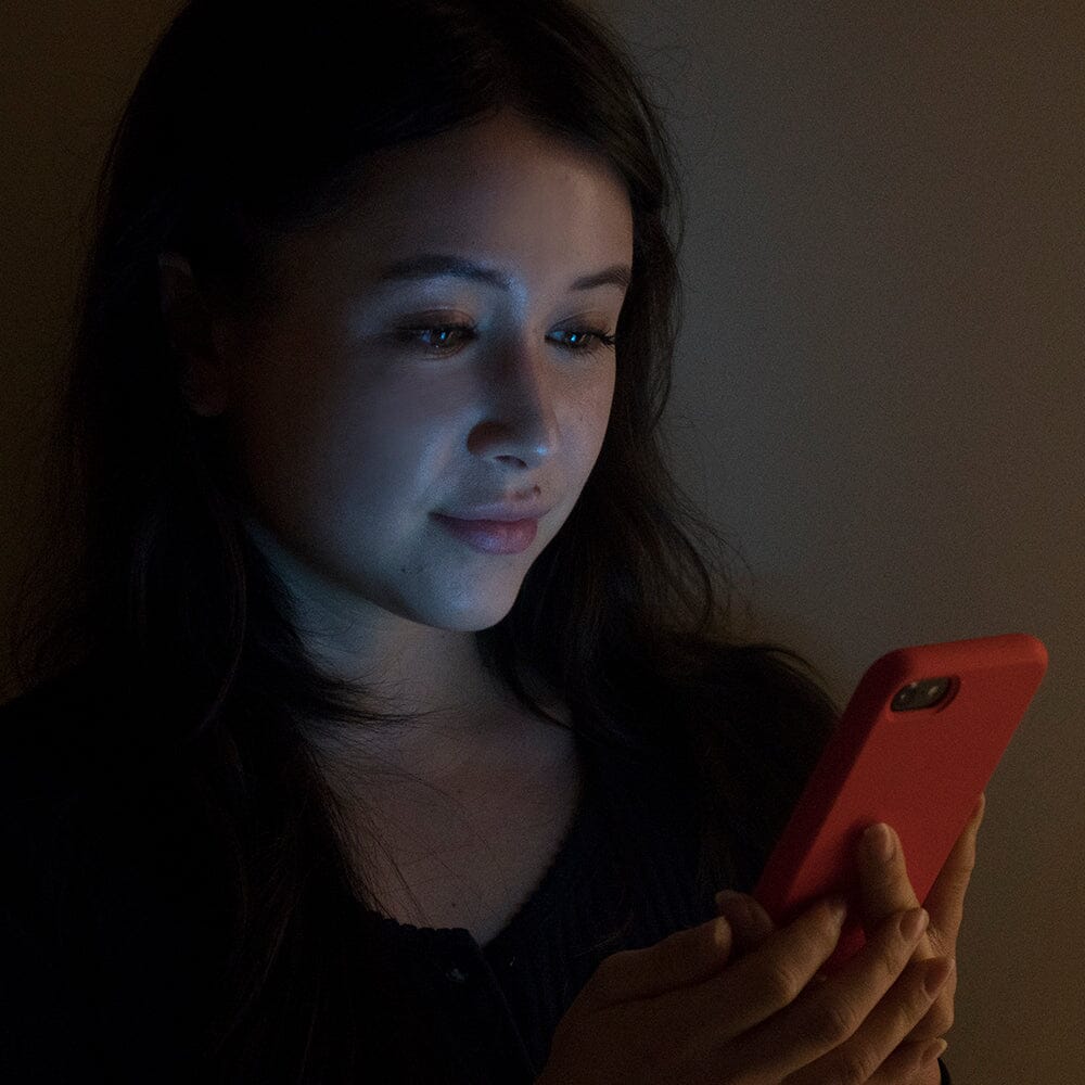 Is Staring At Your Phone Before Going to Bed Messing Up Your Skin?