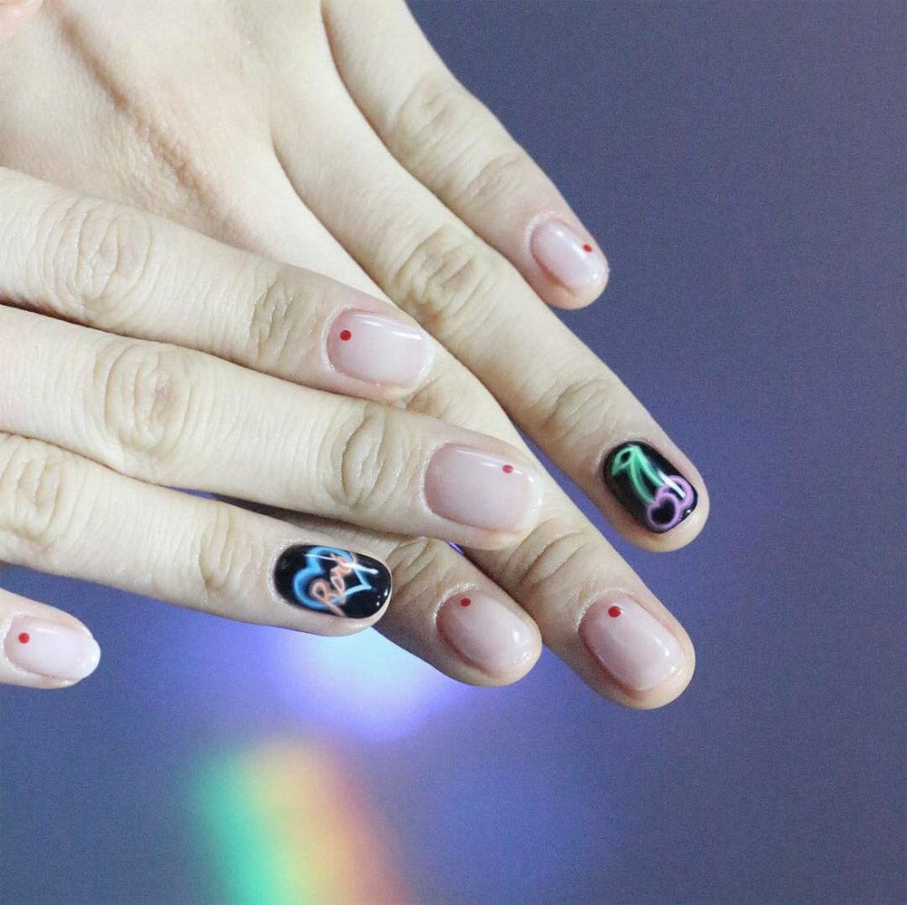 You’re Going to See Neon Sign Nails Everywhere This Summer
